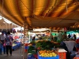 A colourful covered fruit and vegetable market